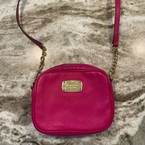 Small, Fuschia with gold hardware Michael Kors crossbody bag